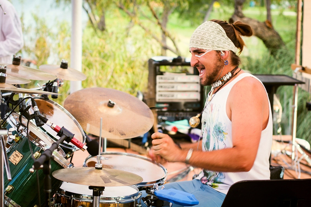 Amadon performing with VansGuard during the Earth Harmony Festival